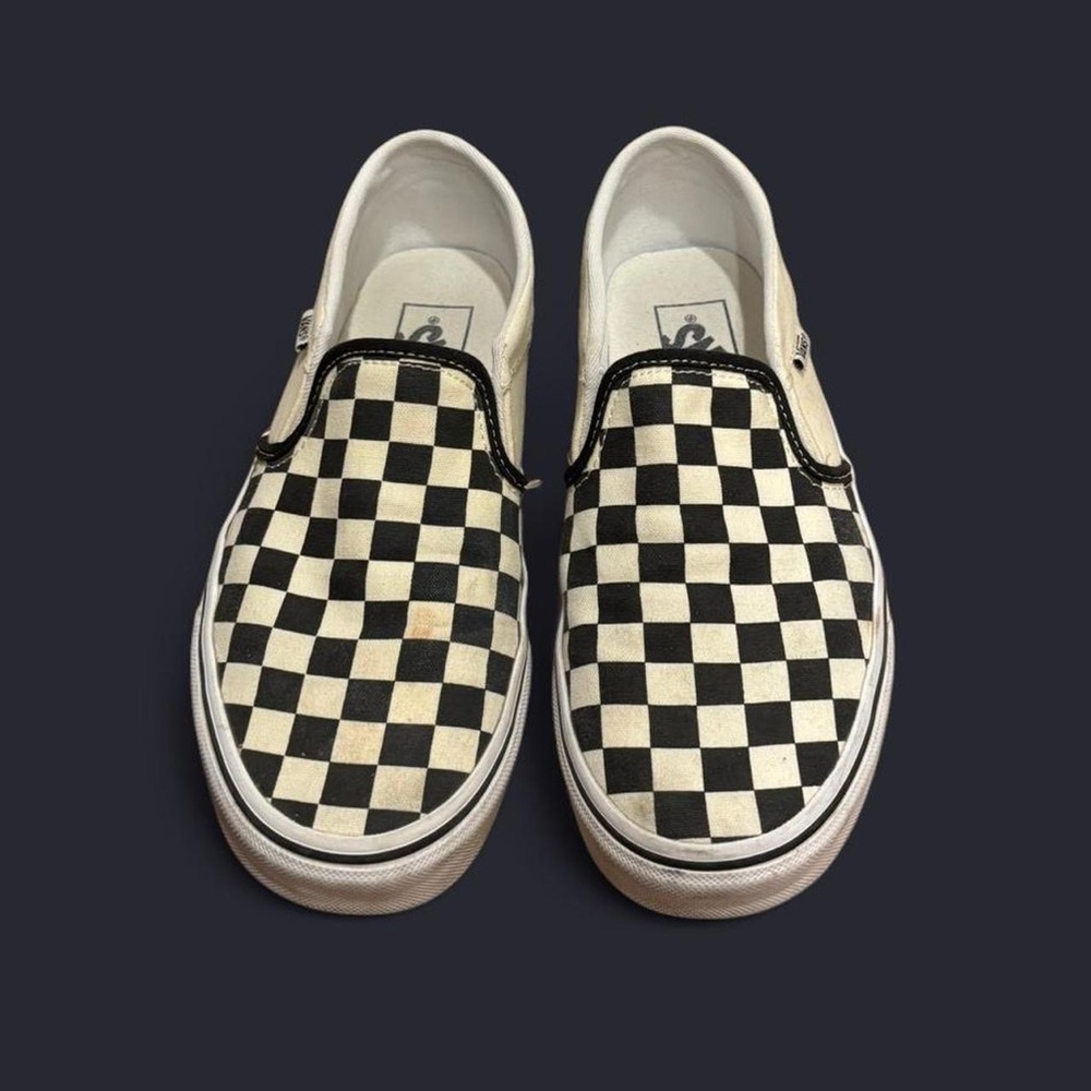 Vans black and white checkerboard slip-ons